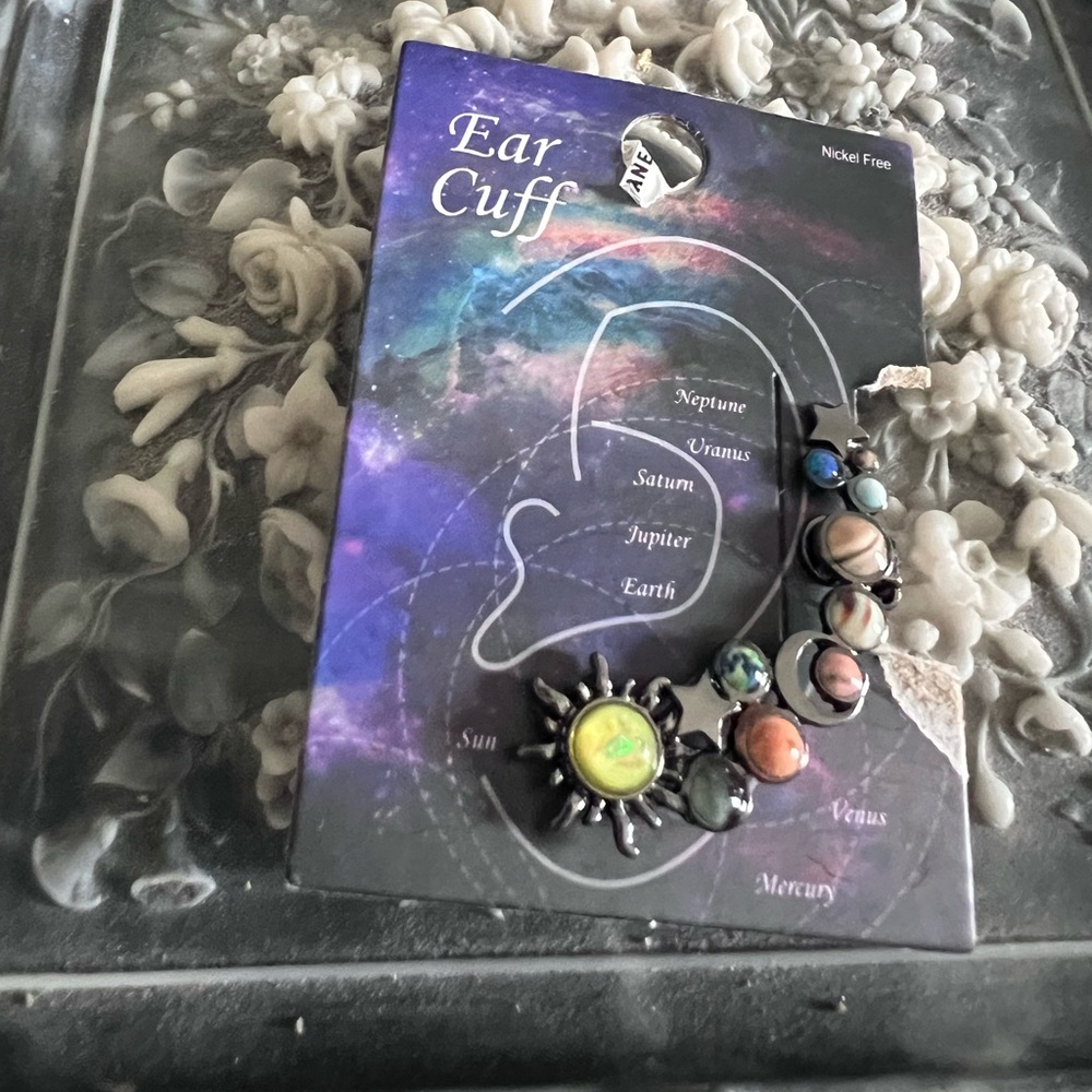 Galaxy runner earring (one) free with purchase over $20.00